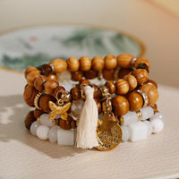 Bracelets Bohême Style Femmes Accessoires Perles En Bois Gland Bijoux Étoile 4pcs / Set