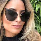 Lunettes De Soleil Fashion Noir Sans monture Design Rétro 2019 Œil De Chat Pour Femmes